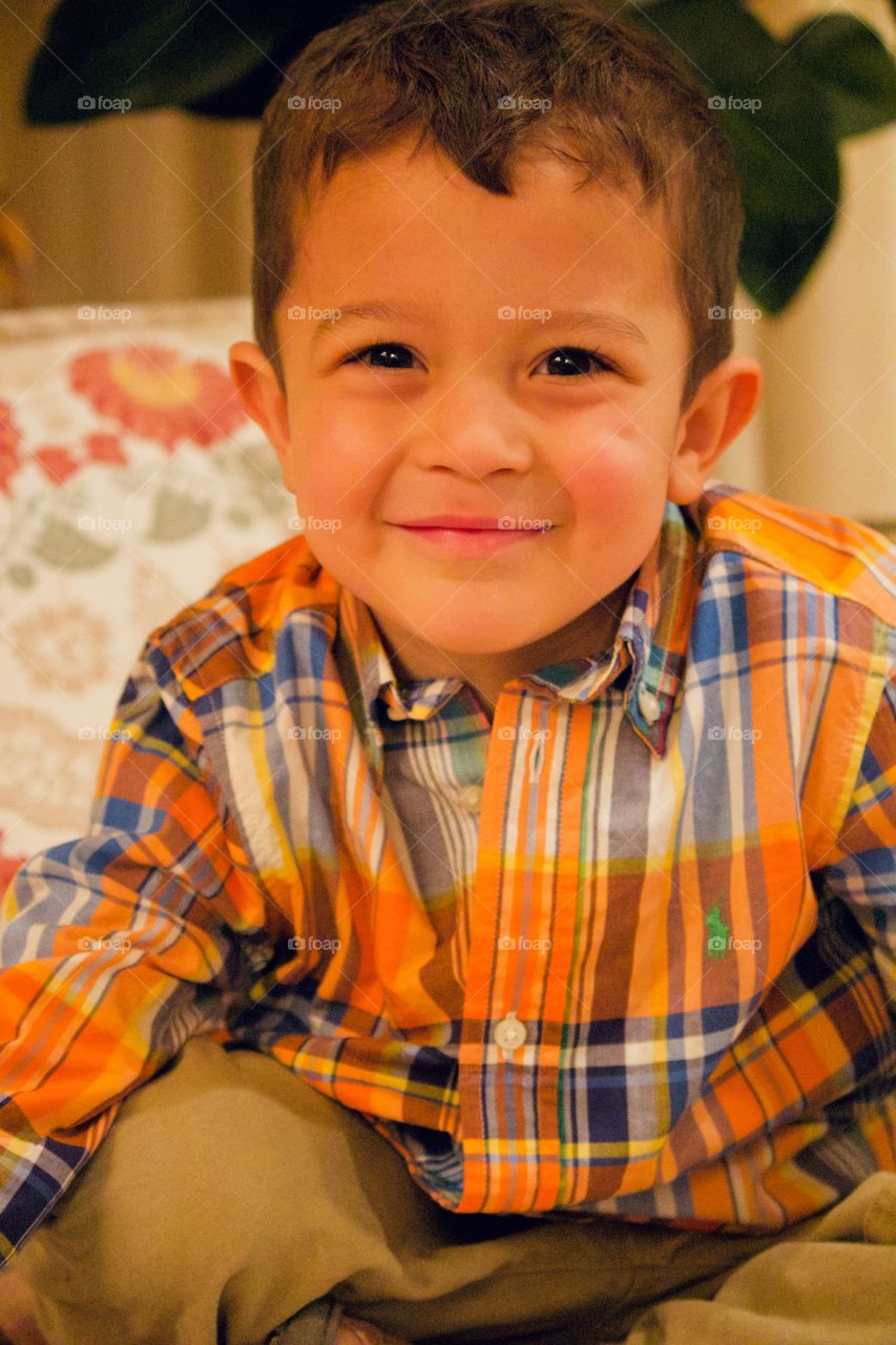 Warm smile from a toddler on Thanksgiving 