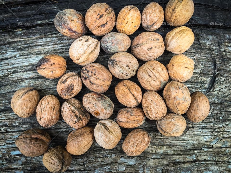 Nuts on rustic wooden table