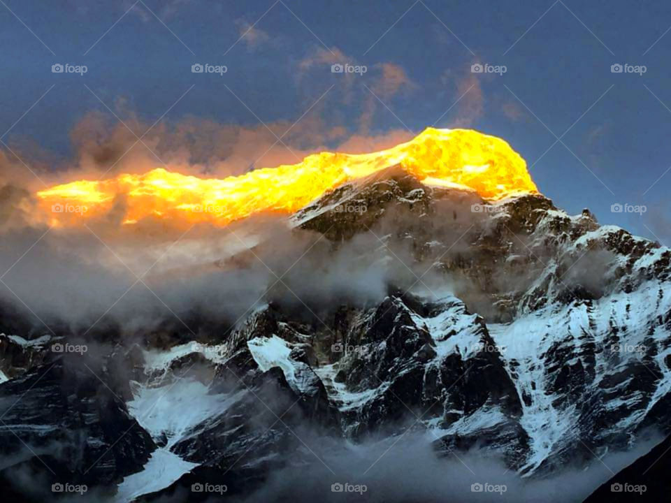 Sunset over the summit of Dhaulagiri (8,127 m). Photo taken on the Dhaulagiri Circuit Trek in Nepal.