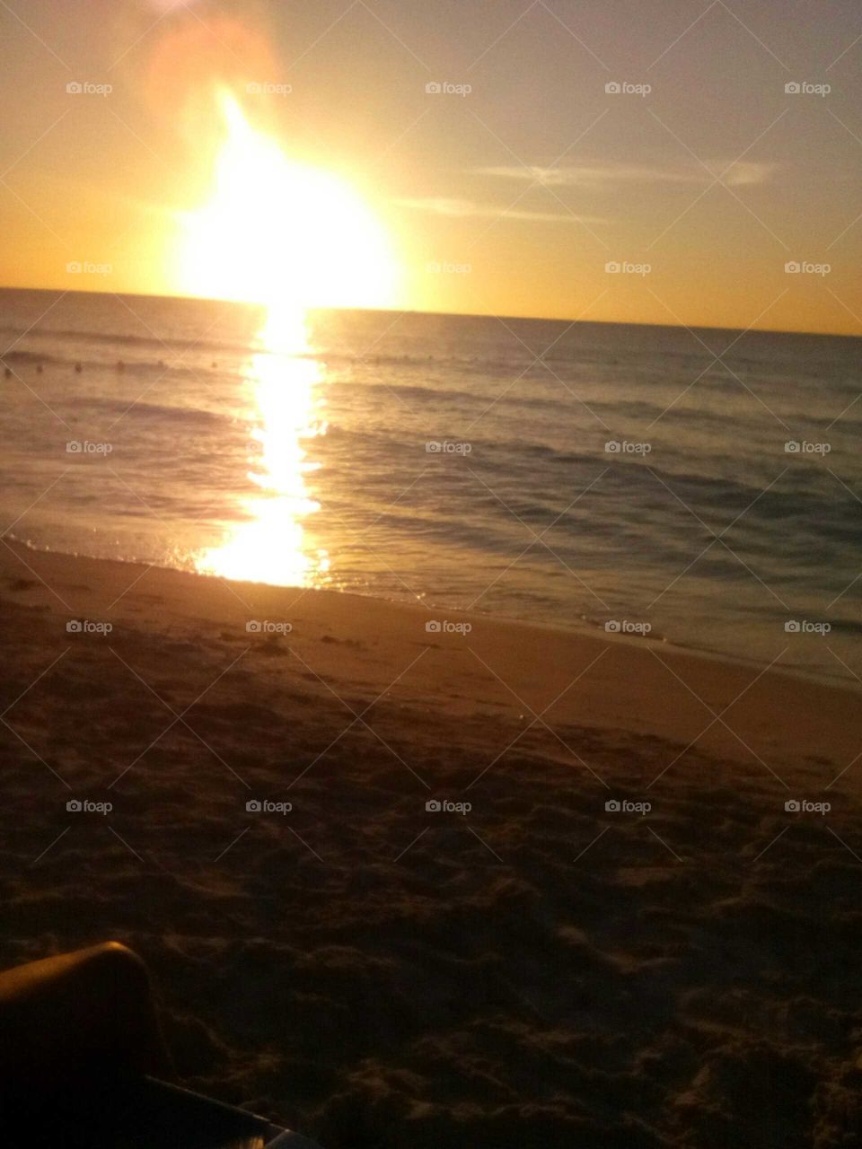 the must beautiful sun sets of the  day sparked in the sea