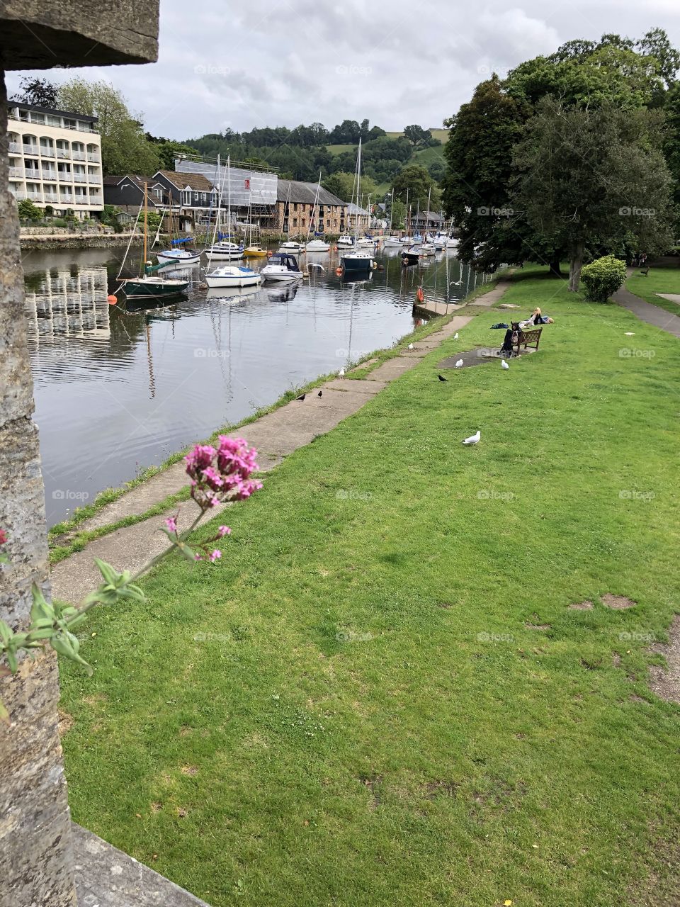 I have added a lovely pink flower and some people in the distance, to give a nice finish to this river scene in Totnes in Devon.