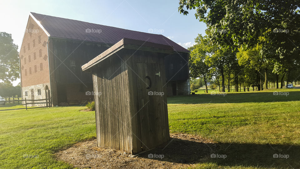 old fashioned outhouse. Vintage outhouse on farm