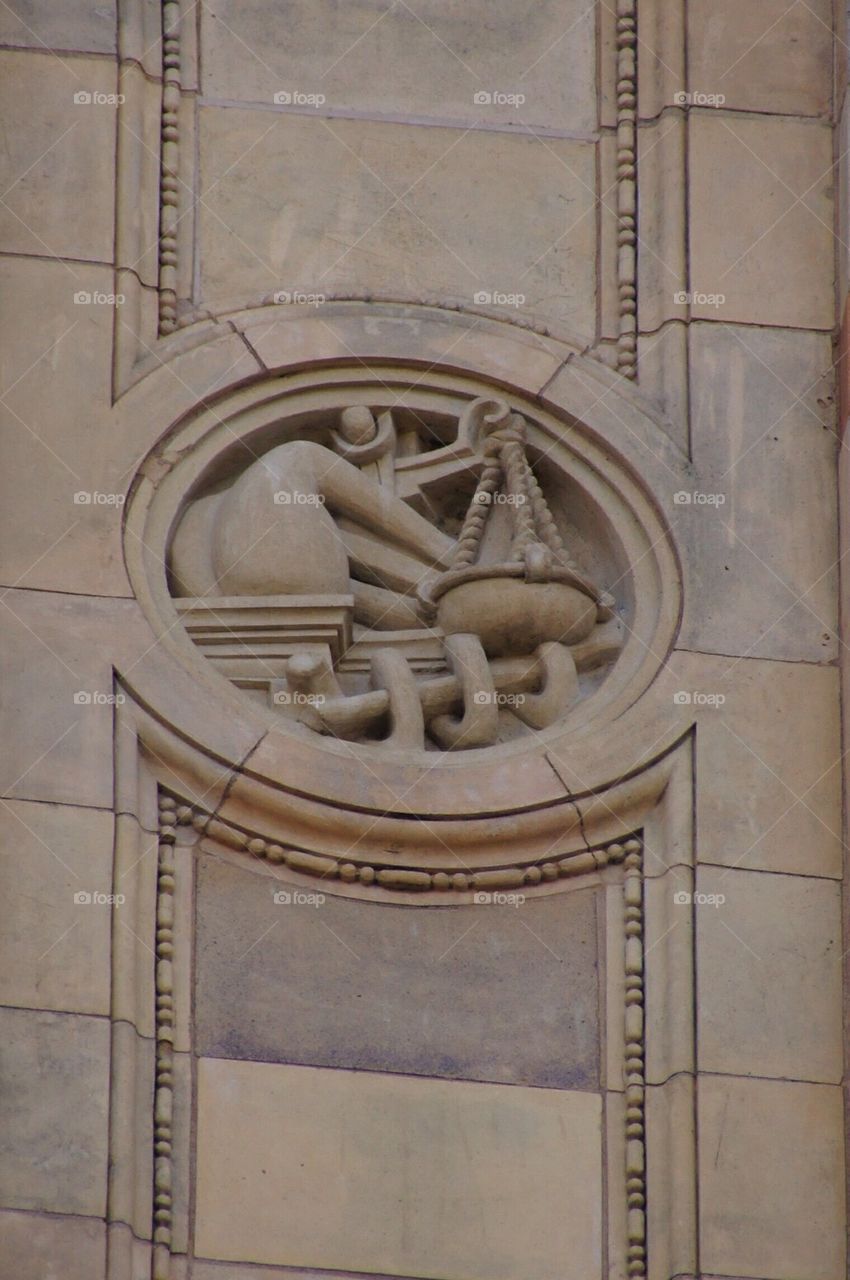 Science symbol on the side of a museum in London England
