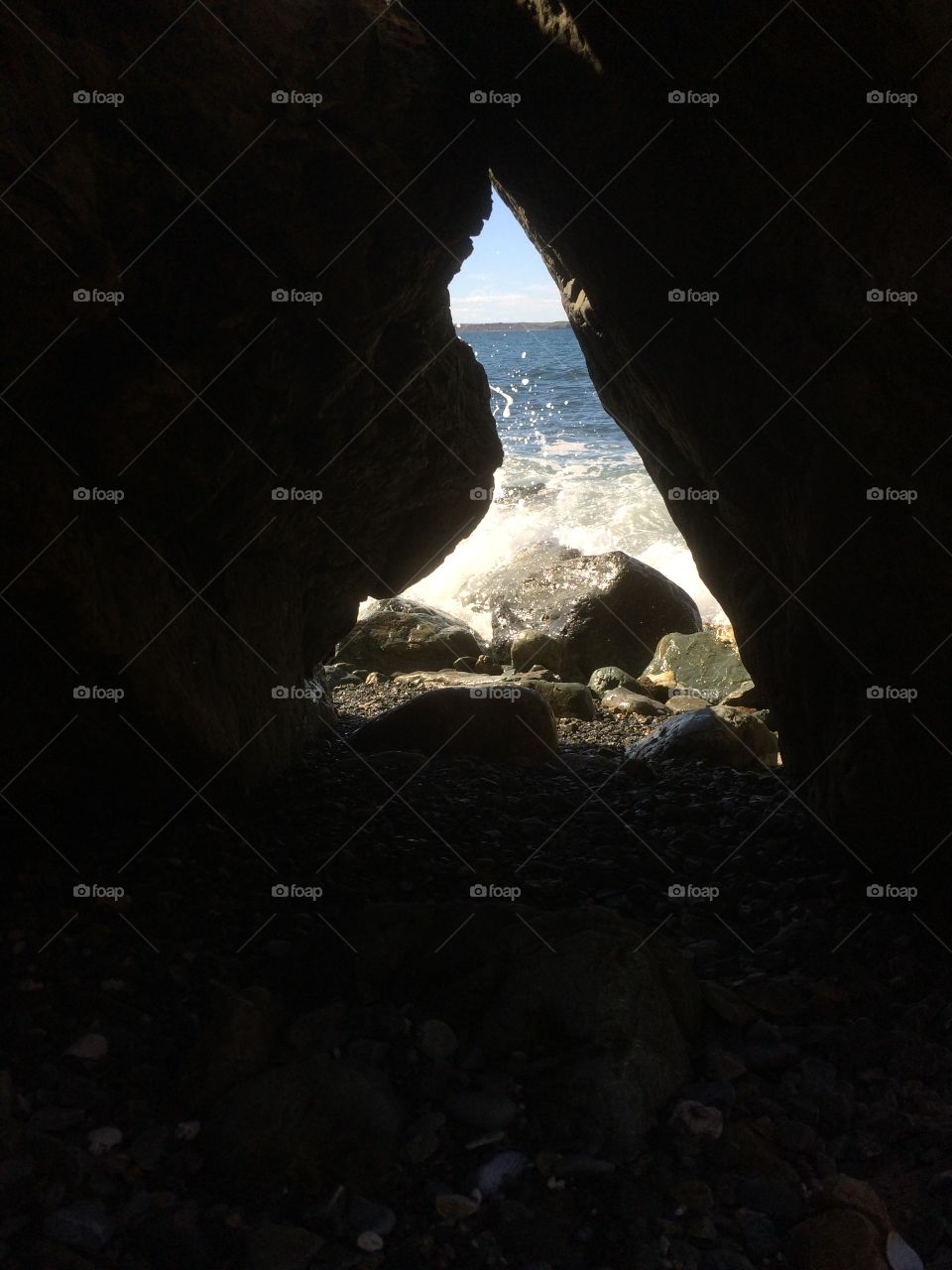 Ocean through a rock