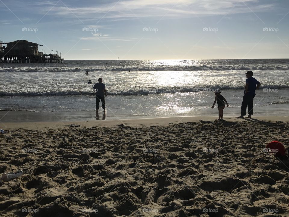 Silhouettes of people on sunset