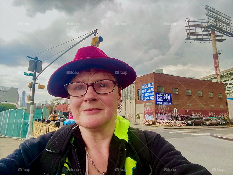 This is me, “Petra Schiller” a.k.a. “Maxine Firefox” a.k.a. “Maximiliane Feuerfuchs” on “Review Avenue” by the “Borden Avenue Bridge” in LIC, Queens in October 2023. Hypnotic Productions