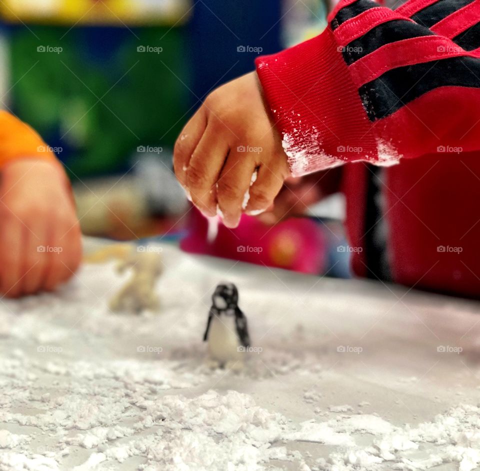 Young Kids at Play, learning and exploring at school