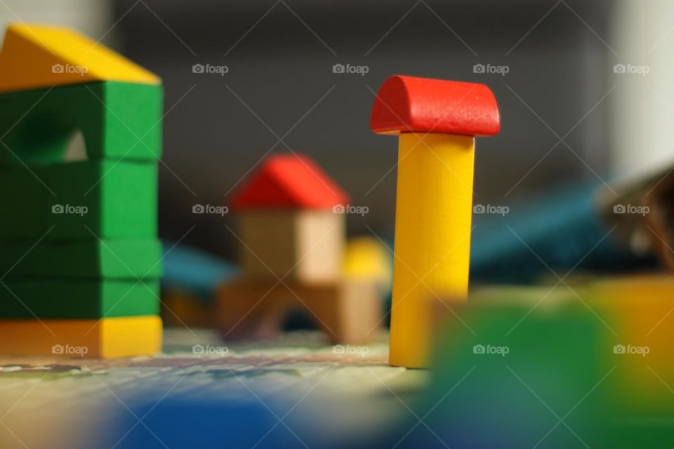 Close-up of colorful stacked wooden building blocks