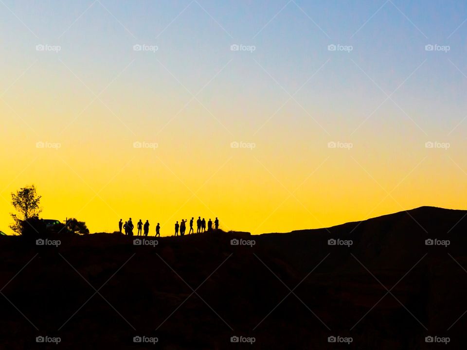 Nature - silhouette of friends at sunset