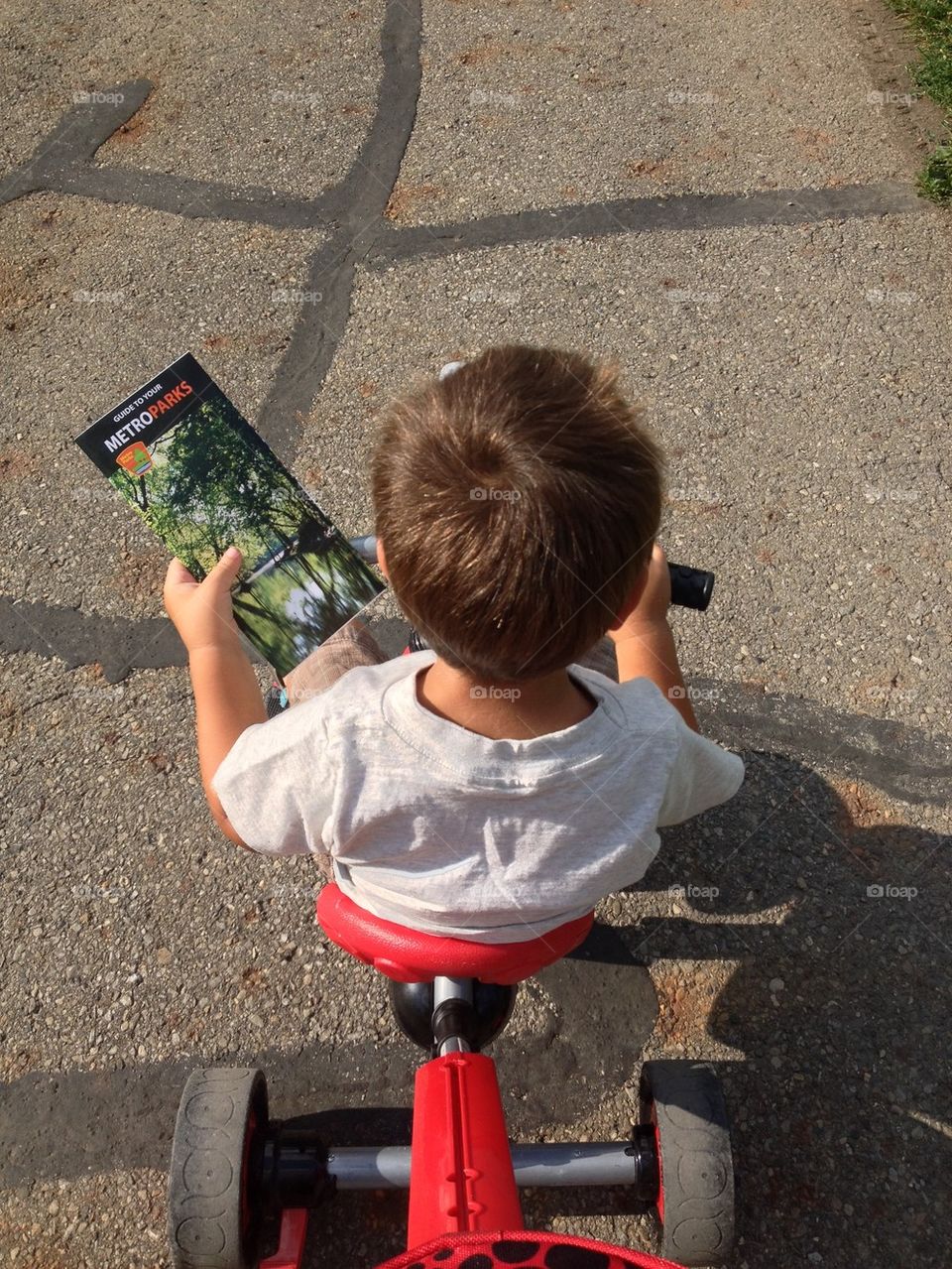 Child riding tricycle 