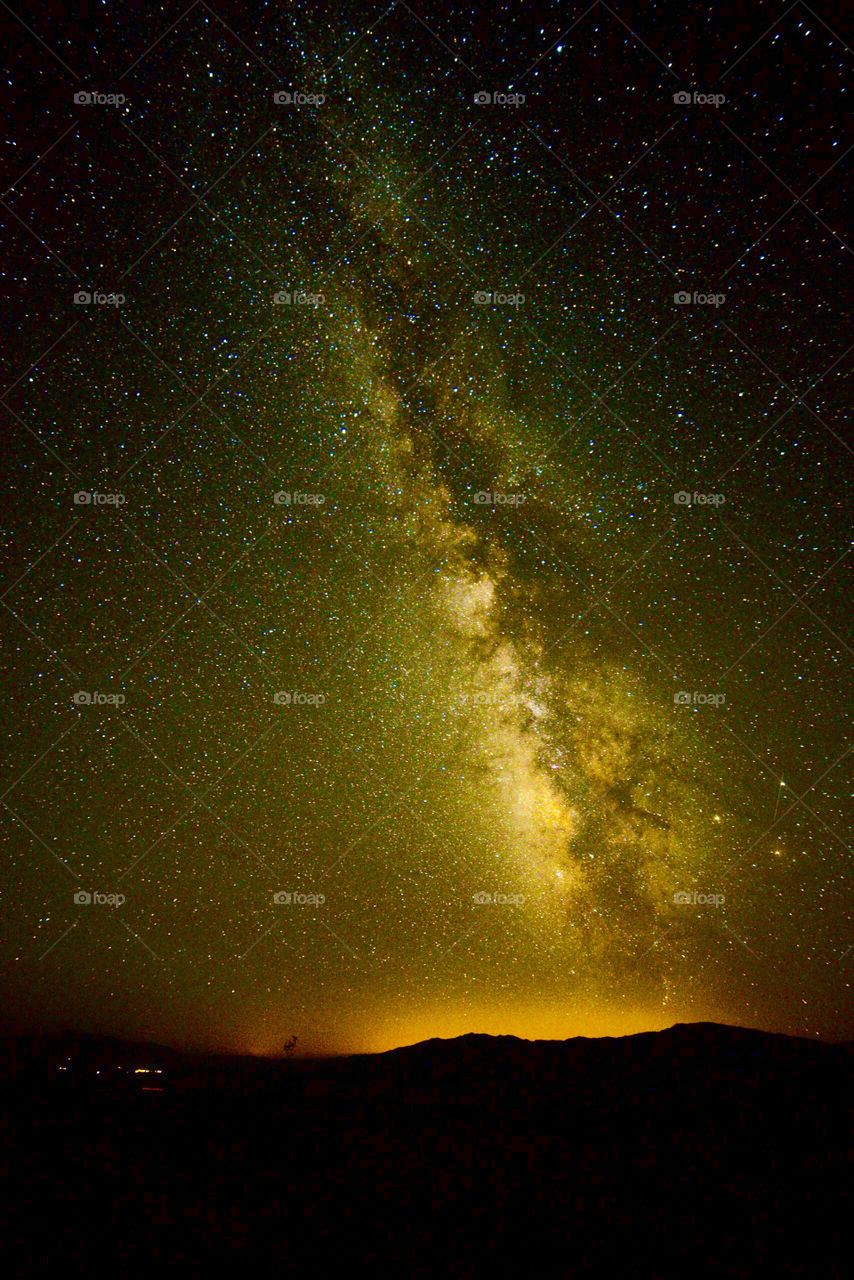 Summer in the mountains under the milky Way