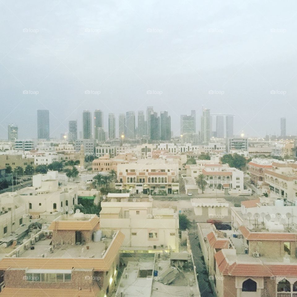 A view from a high floor of the Arabian City Abu Dhabi displaying eastern and modern architecture combined 