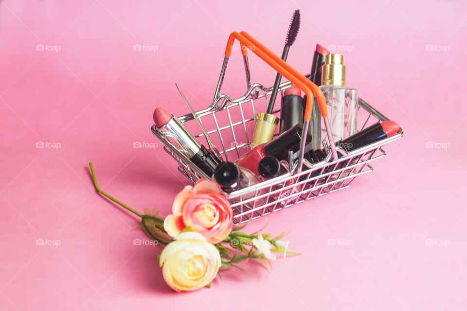 decorative cosmetics in a basket