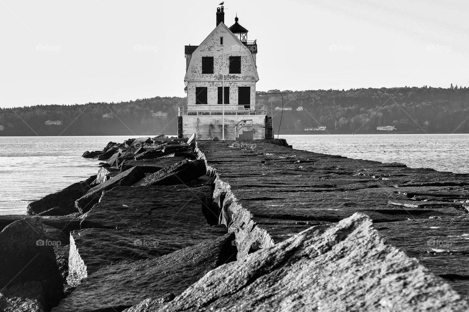 “Breakwater Light”. A seagull patrols Rockland Harbor from the chimney of the light keeper’s house at the end of the Rockland Breakwater in Midcoast Maine.