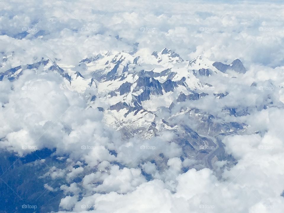 Aerial view of cloudscape over mountain