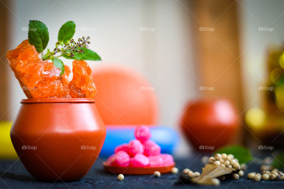 Orange coloured rock sugar which is good to health.Also there are pepper flavoured rock sugar candies.