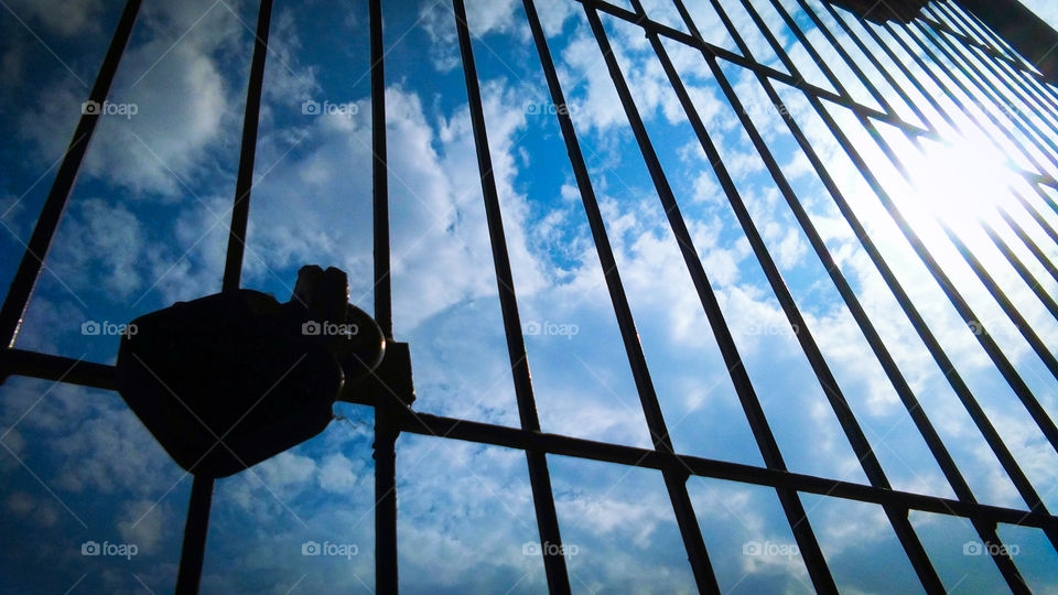 sky and cloud through silhouette window frame