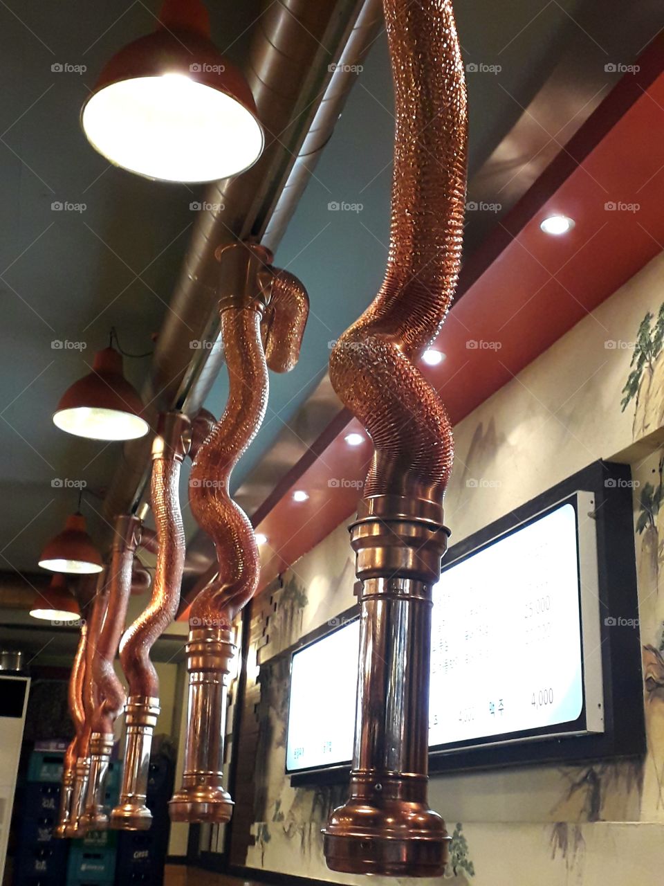 The tube for letting out the smoke which come from fried meat in Korea. it is specialized in Korea I beleive.