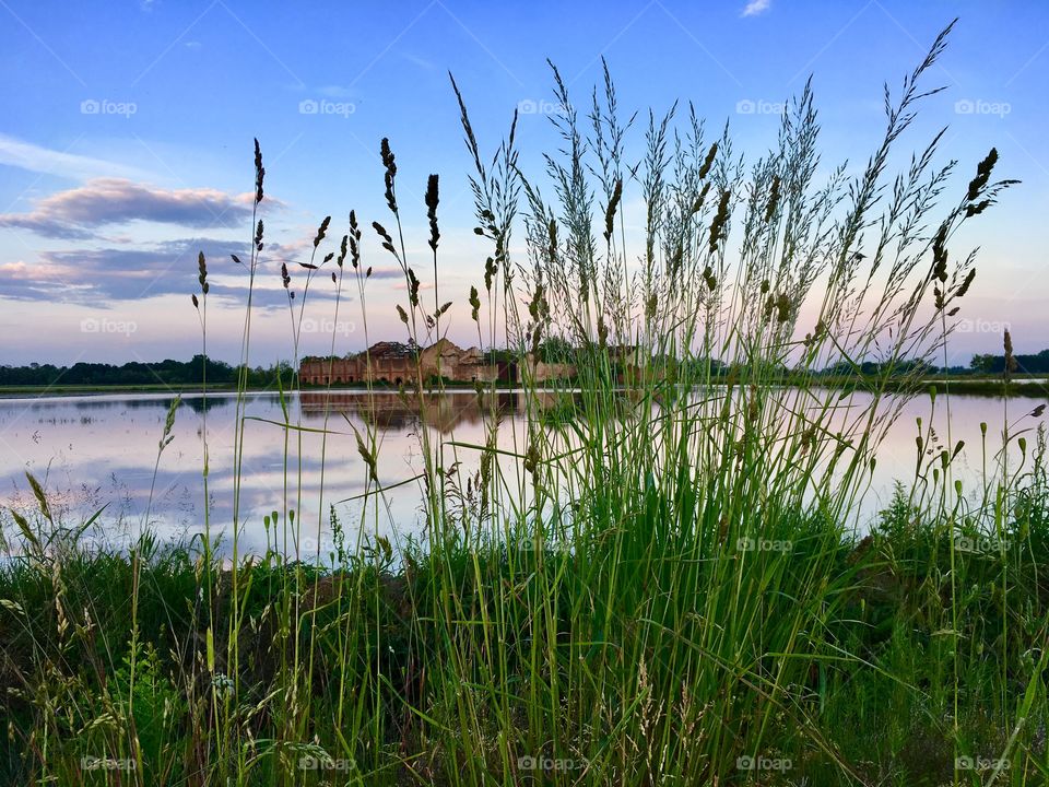 old abandoned farmhouse surrounded by rice fields, in the territory of Novara