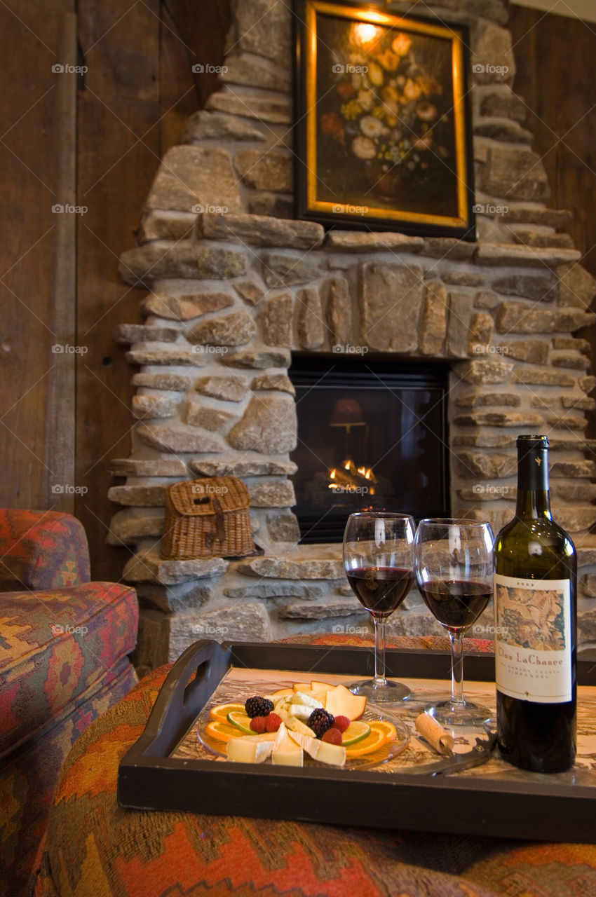 Wine and cheese by the fire