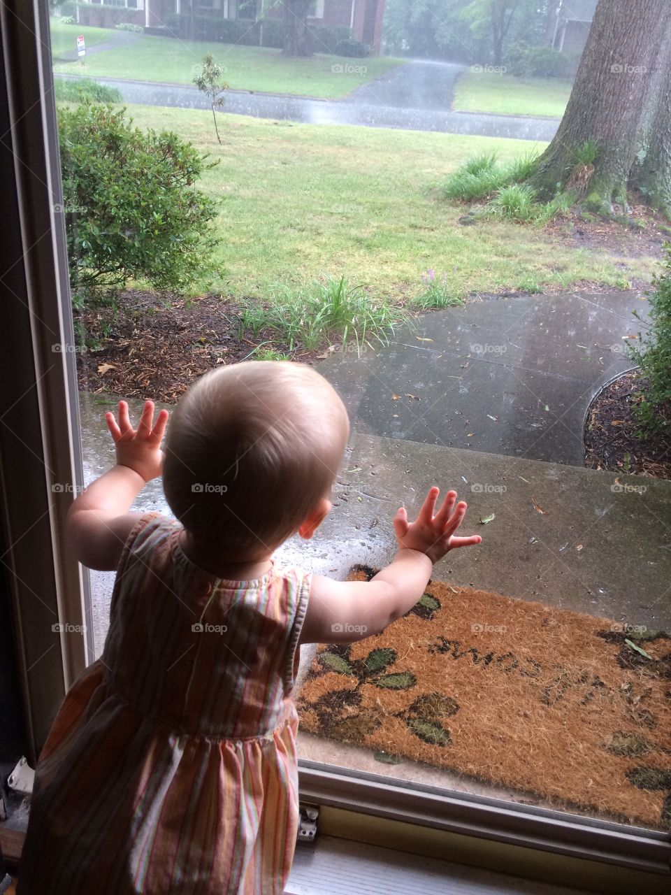 Waiting for daddy in the rain