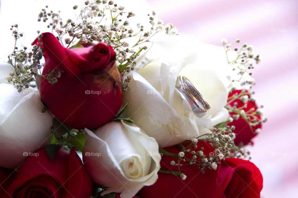 Wedding rings on flowers