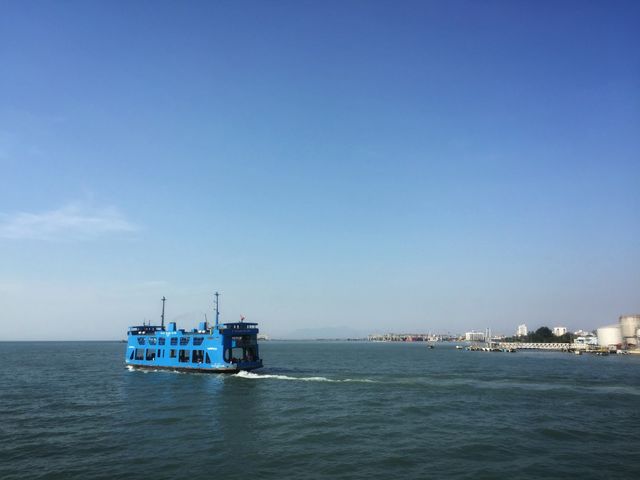 A blue painted island ferry.