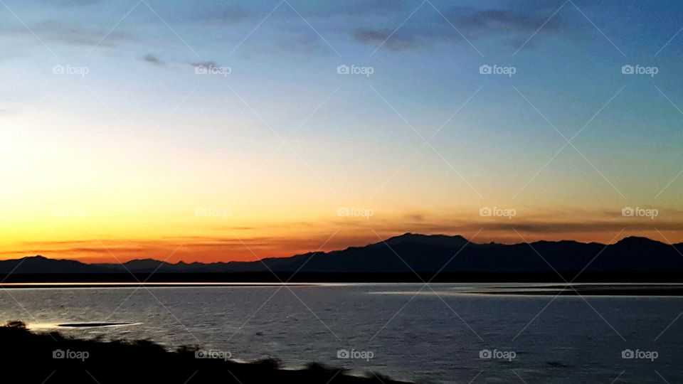 the Great Salt Lake near Bonneville and the surrounding mountains in Utah near Salt Lake City in 2017 United States of America