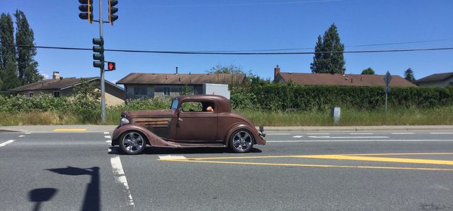 Rusted Vintage Car Going for a Ride through the Country 