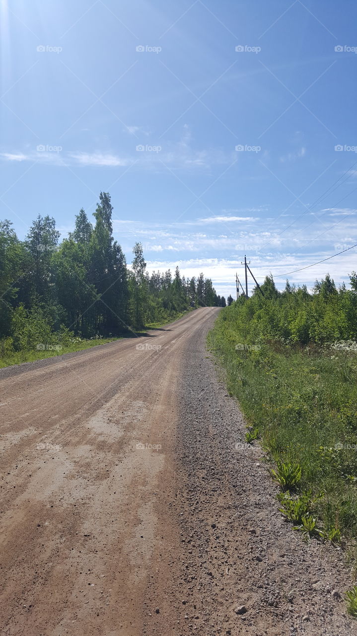 Old country summer road in Finland