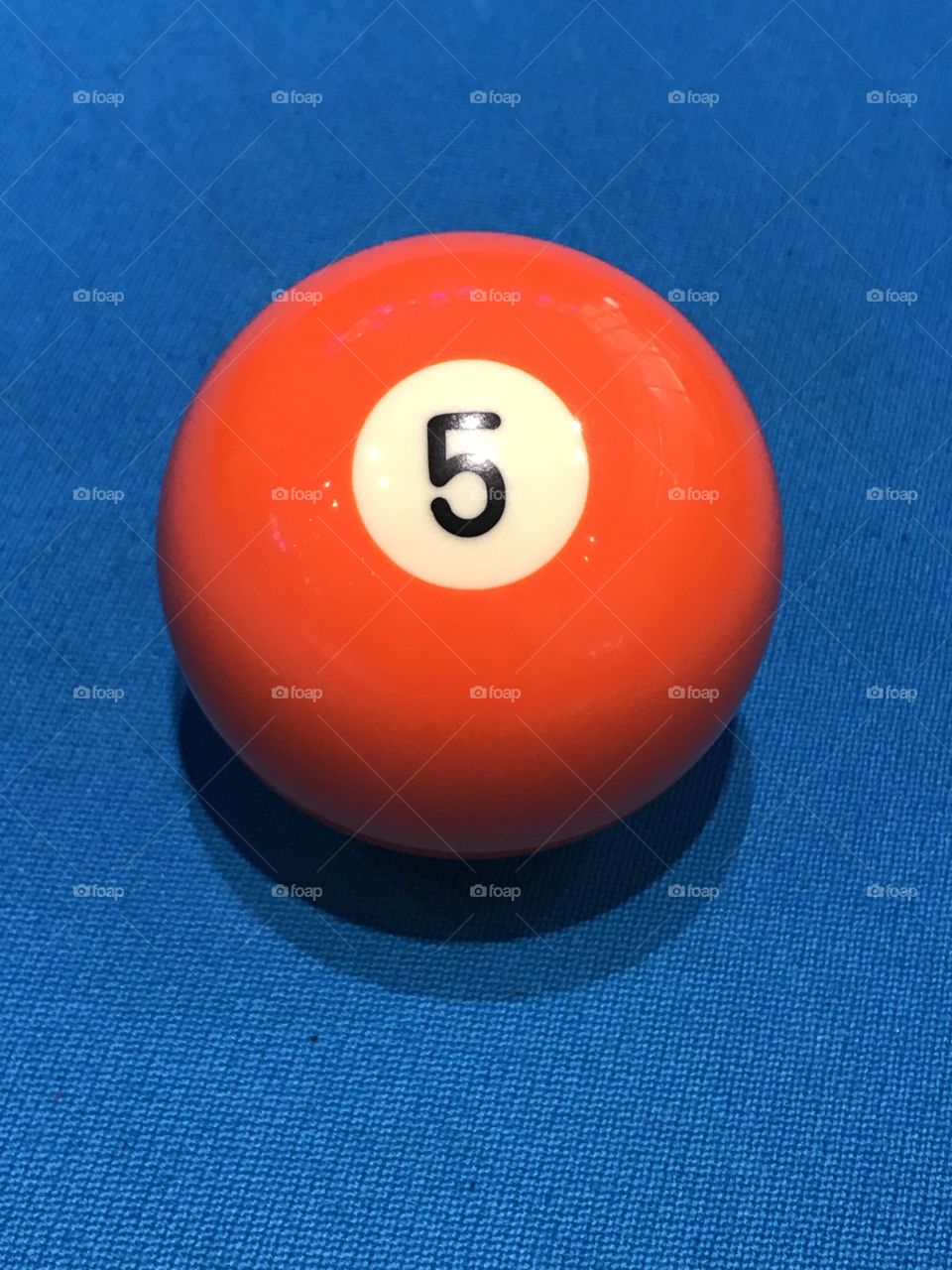 Orange billiards ball