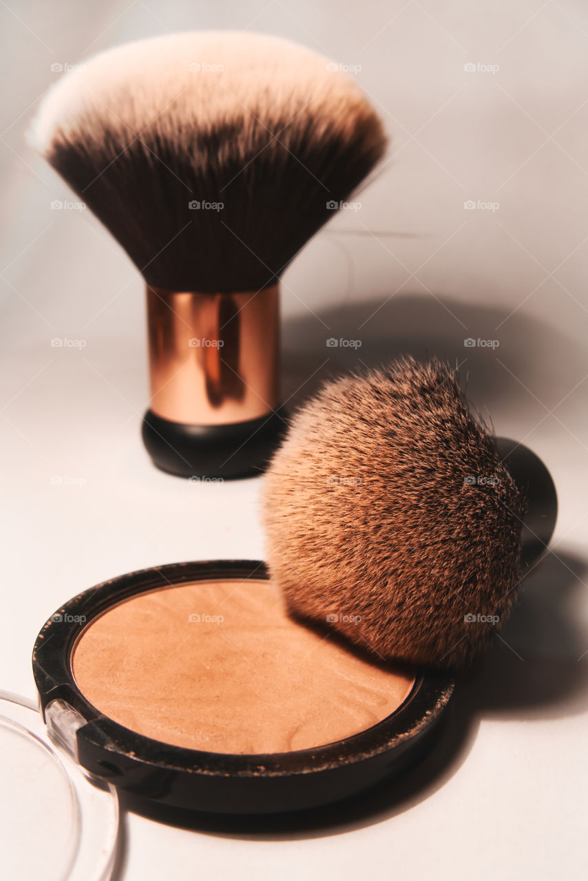 Female products powder and brushes