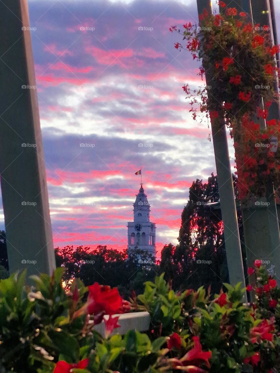 red clouds above the city of Arad