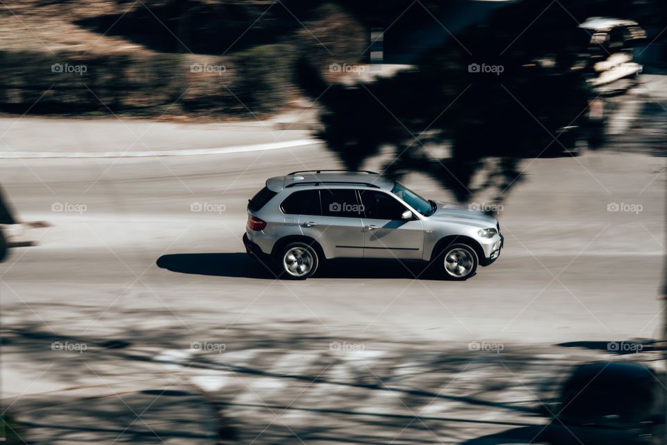 Bmw x5 in motion on the road