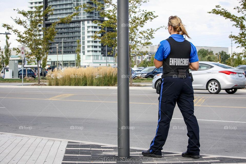 Woman working in enforcement