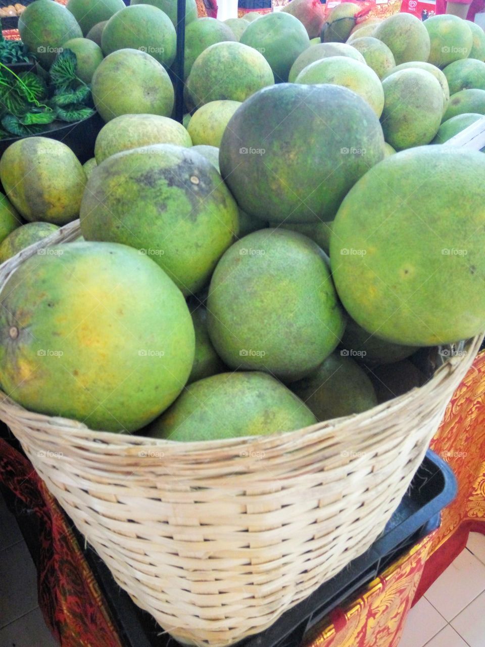Pomelo (balinese orange) is kind of orange fruit that has a big size than another oranges.