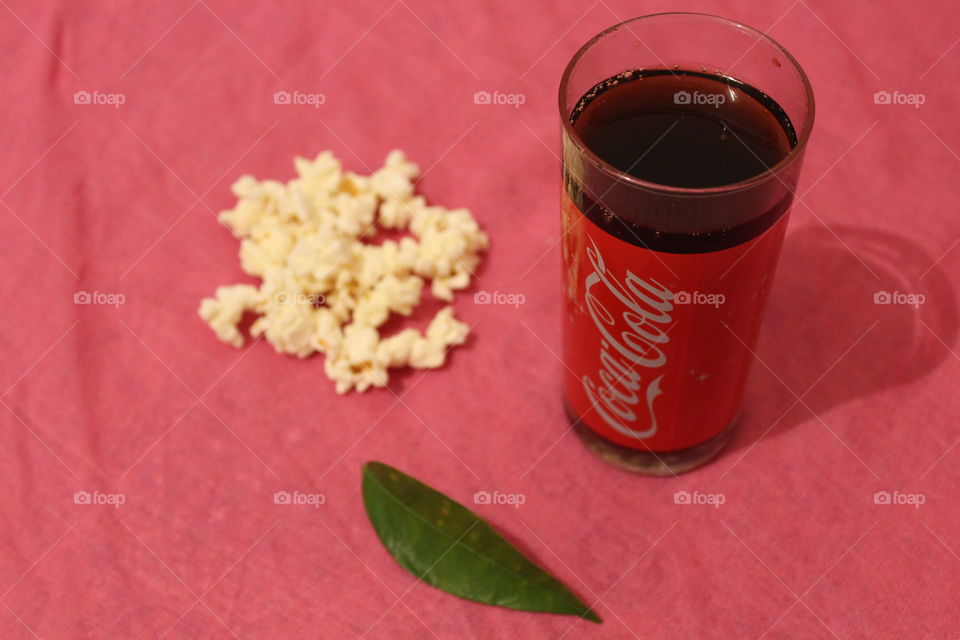 cola cup and popcorn