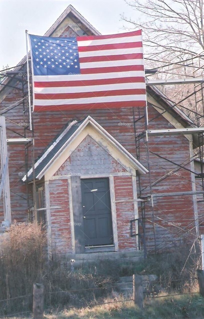 Old house with American flag