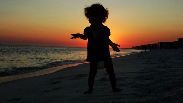 Baby at sunset