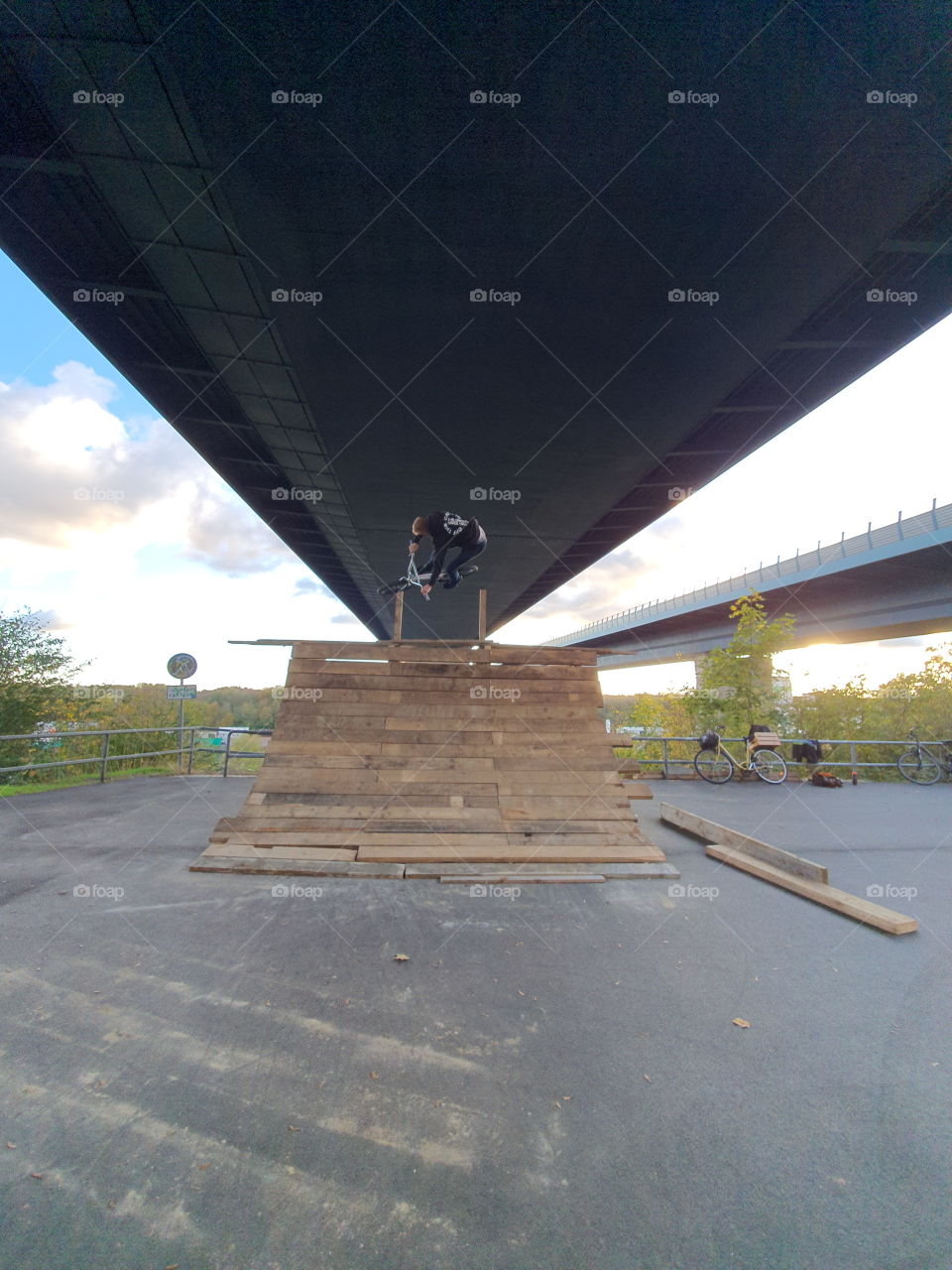 bmx on a wooden quarterpipe