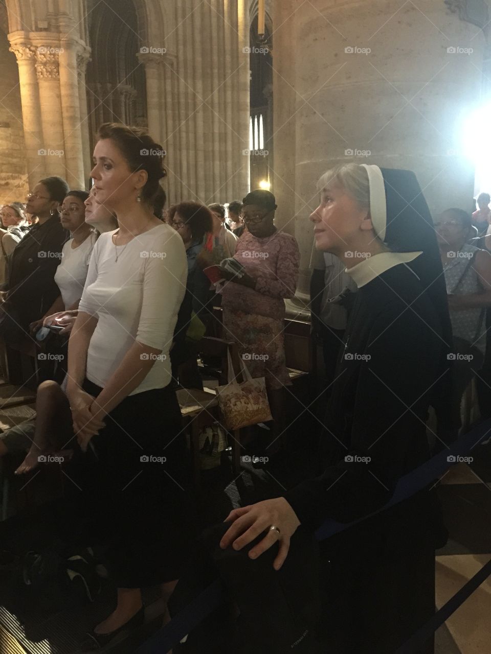 Nun in Notre Dame de Paris