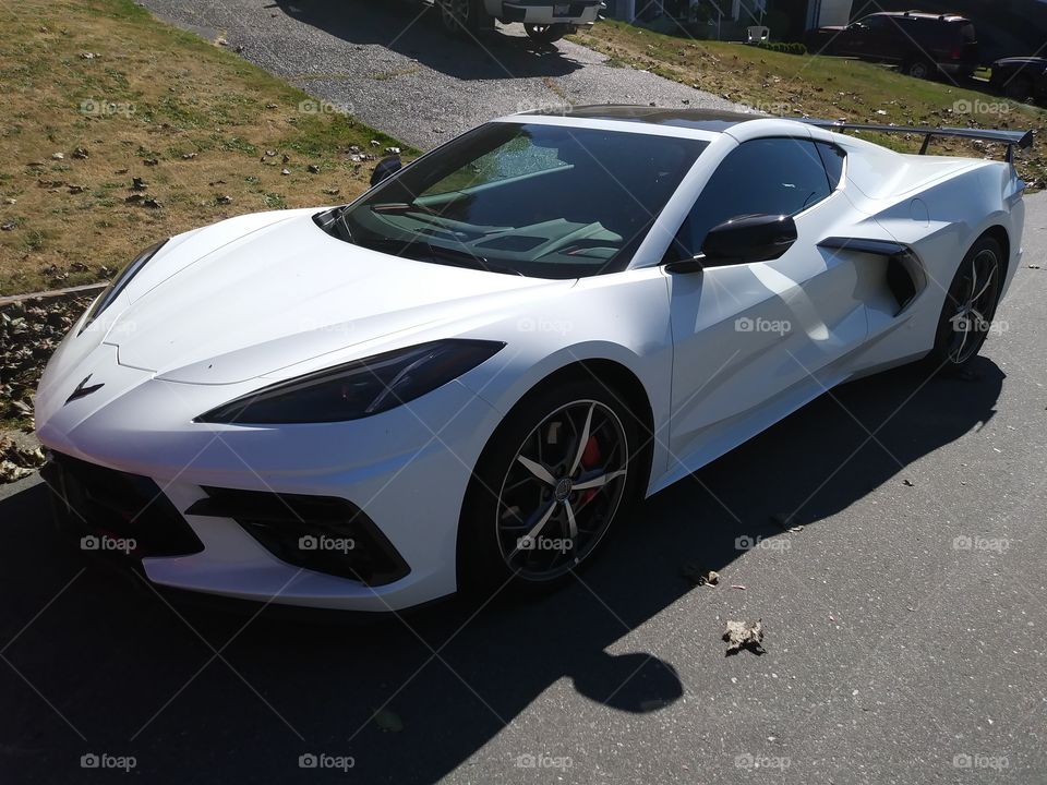White Corvette on the Road 