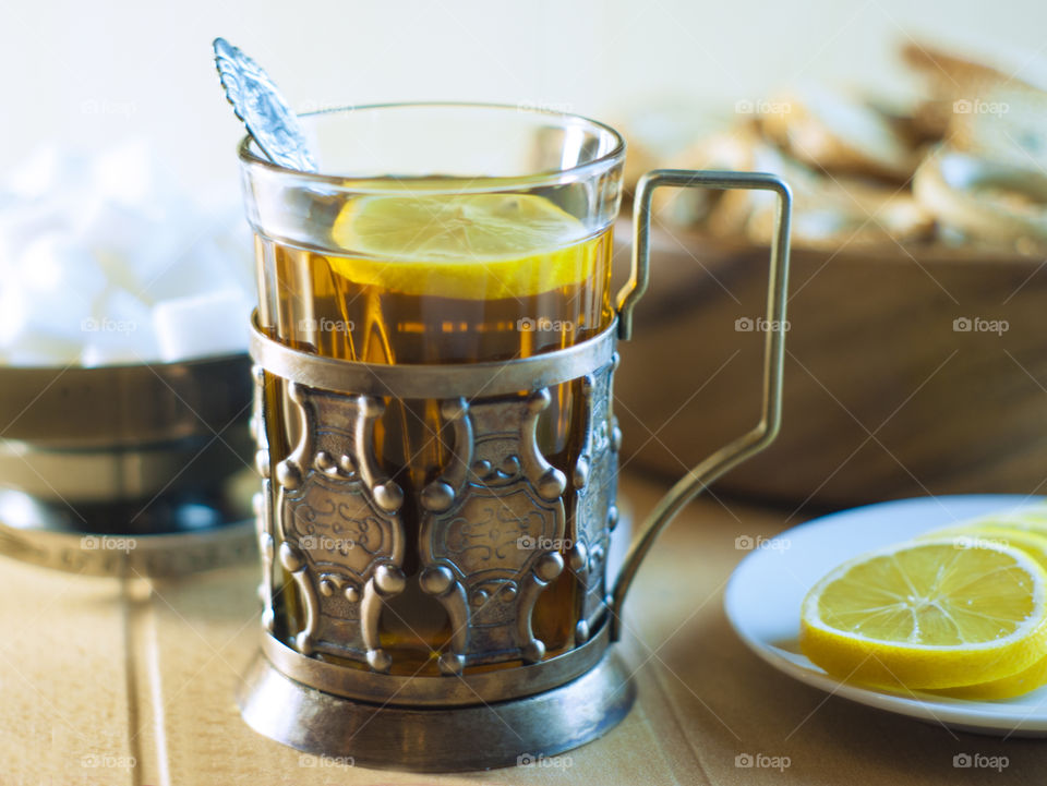 Tea in an old cup holder