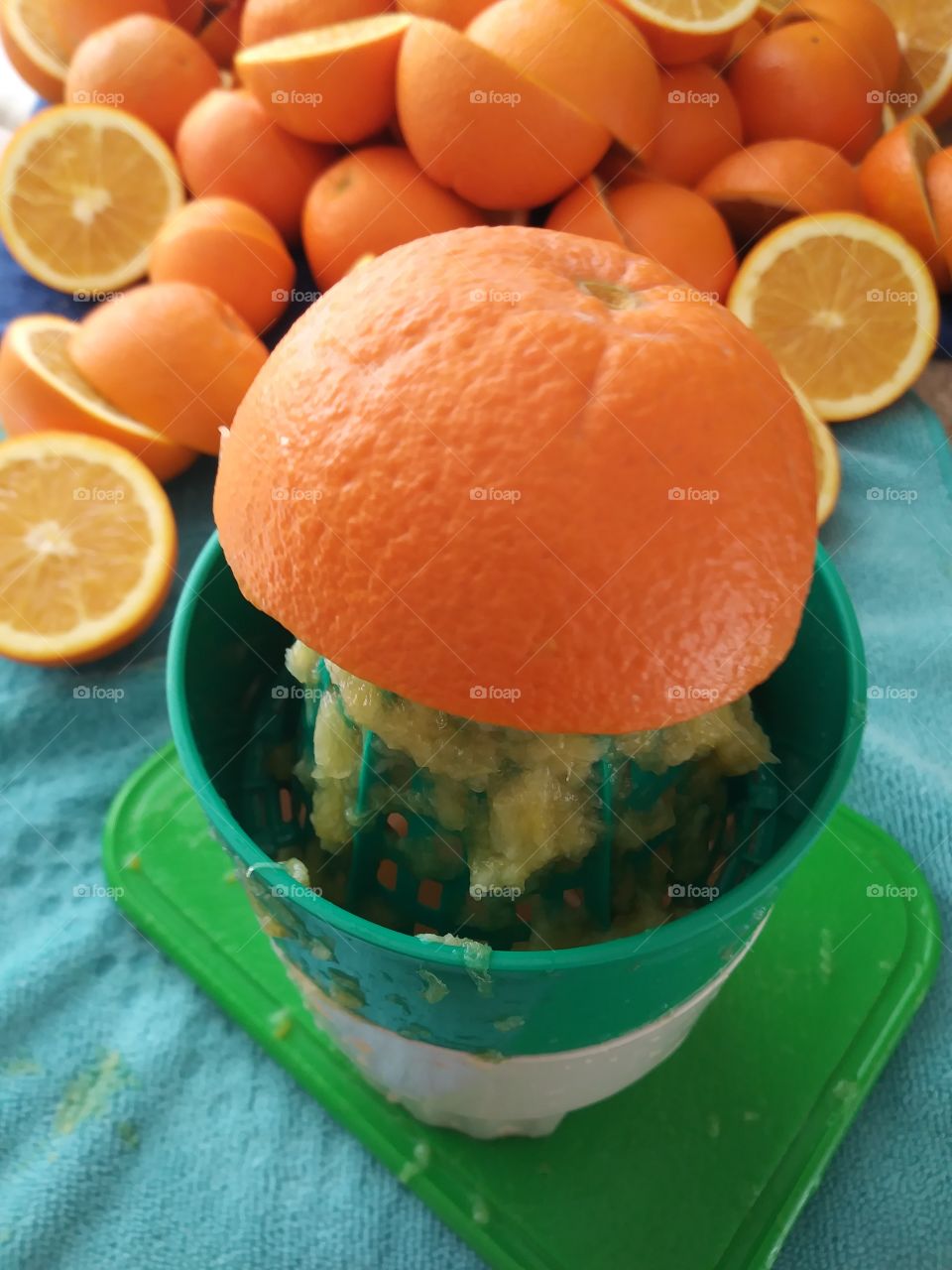 Juicing Fresh Ripe Oranges
