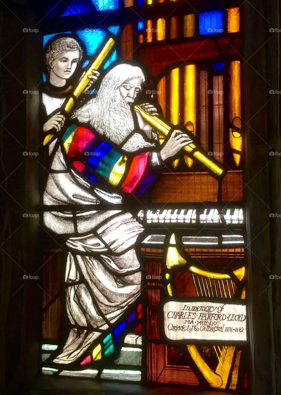 Stained glass window from Gloucester Cathedral, in memory of an organist.