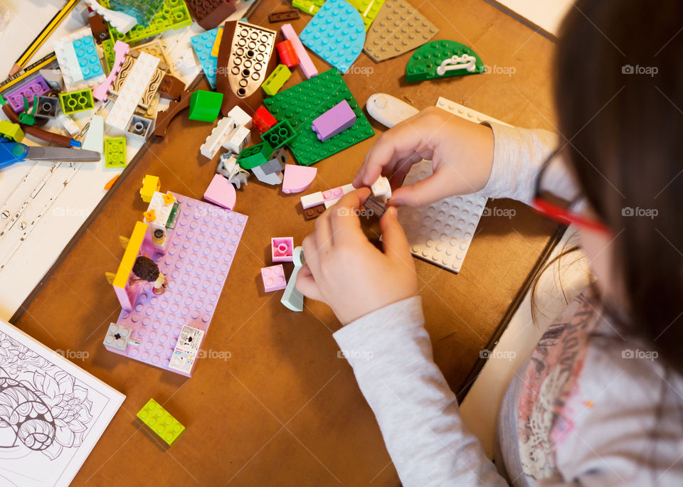 Girl building woth blocks