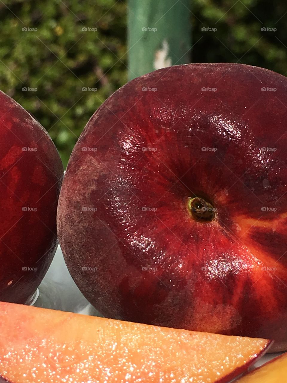 Red ripe peach, dewy, juicy, outdoors  closeup