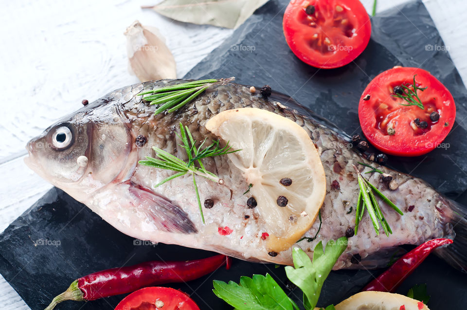 Healthy fish with lemon slice