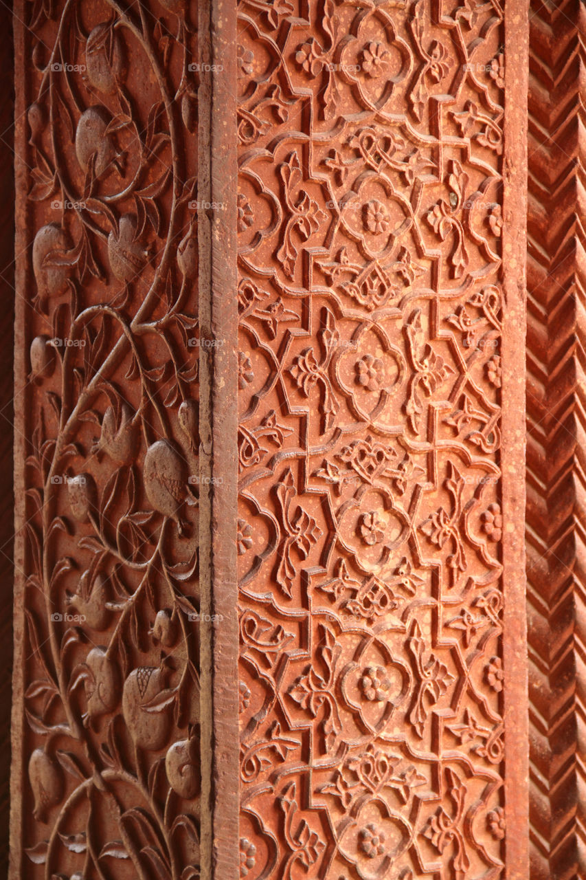 Detailed design carvings on stone in qutub Minar, New Delhi, India