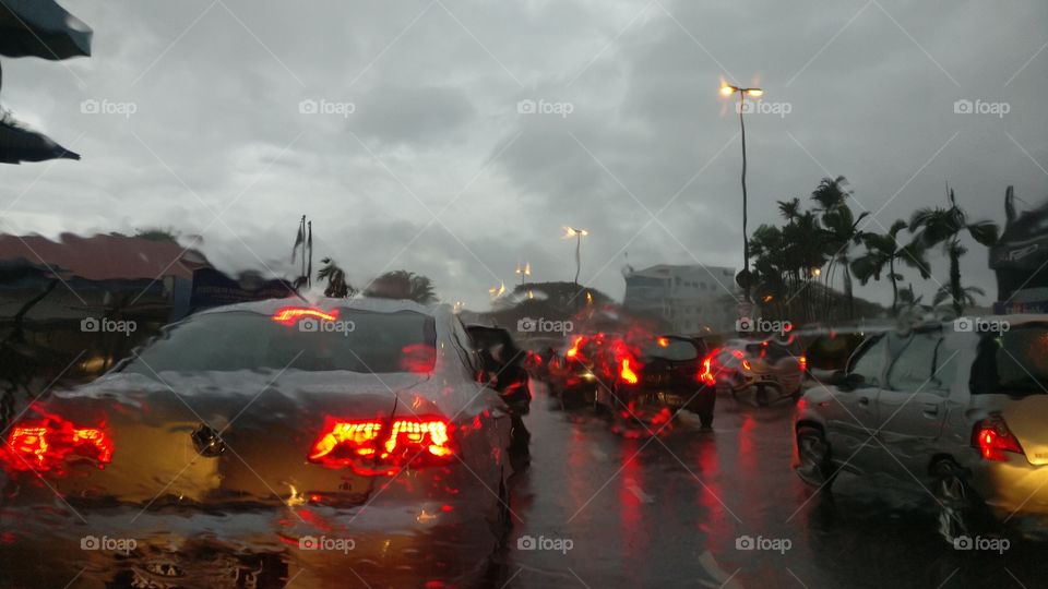 Heavy rains makes the already slow and heavy traffic even more time consuming. The daily struggles of workers and drivers the world over.